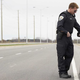 Image for article titled Ticketed Motorist Pointing Finger Just The Green Light Cop Needed